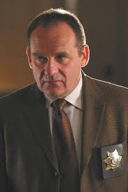 How tall is Paul Guilfoyle?